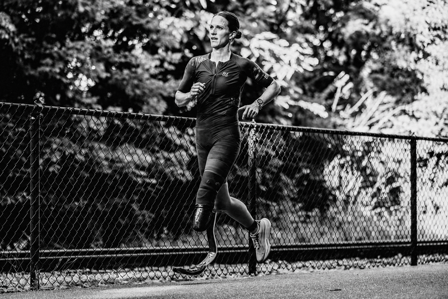 Hannah Nabors smiling outdoors while wearing her below-knee prosthesis