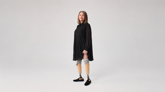 Lower-limb amputee wearing the Underlay beneath a prosthetic liner