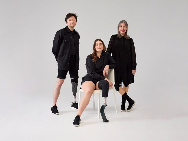 prosthetist adjusting prosthetic socket fit amputee clinic